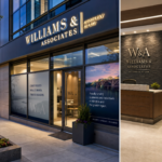 A modern commercial storefront in Arlington, Virginia featuring illuminated channel letters, custom window graphics, dimensional interior signage, and branded event displays.