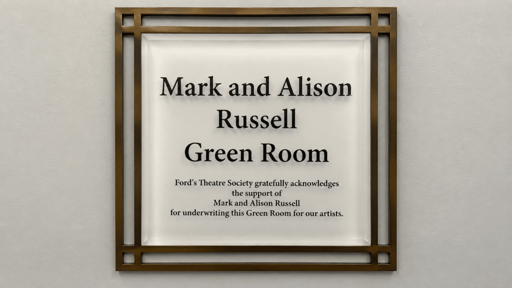 Custom acrylic architectural plaque with a decorative metal frame completed by District Visual Communications in Washington, DC.